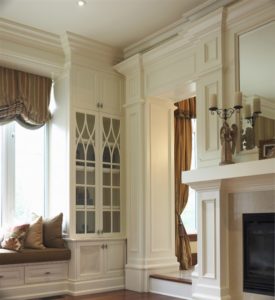 elaborate and ornamental mouldings and trimwork in living room