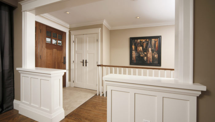 Wainscoting in hallway as a room divider